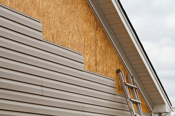 Professional Siding Installation technician working in Union Mills, NC